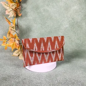 Ikat Clutch Mustered Colour with White Zig Zag Design.